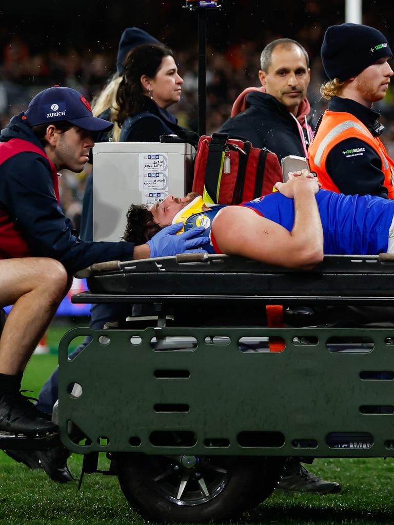 Angus Brayshaw leaves the field after being knocked out in the qualifying final. Picture: Dylan Burns/AFL Photos via Getty Images