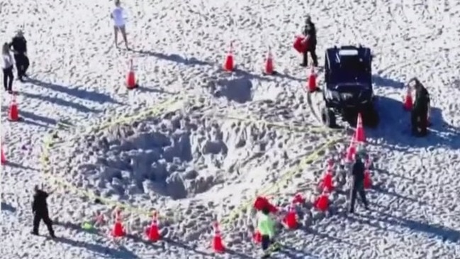 Dangers Of Digging Holes On The Beach Gold Coast Bulletin