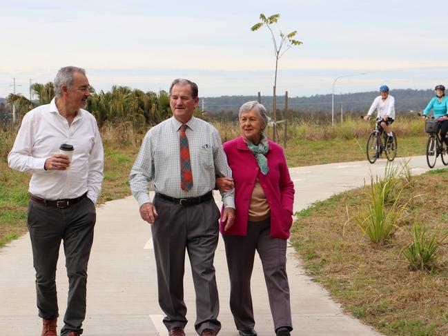 Clarence MP Chris Gulaptis with Clarence Valley Council Mayor Jim Simmons and his wife Lexie. A cycleway from Townsend to Maclean will be completed with state government funding.Bob and Judith Little from Maclean (in background) are frequent users of the pathway that traverses from the Maclean Interchange to Townsend and are looking forward to it linking to existing pathways at Townsend and Maclean.