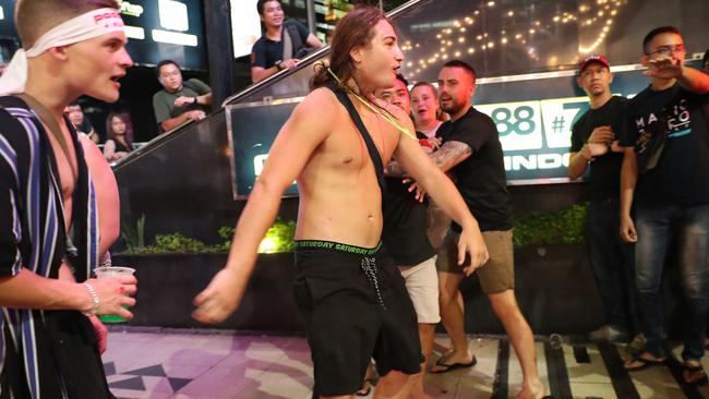 Young Australians fighting in the street in Bali. Picture: Liam Kidston