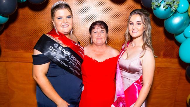 Gympie Show Society Presdient Deb Brown (middle) with Gympie Showgirl and Charity Showgirl Bronte O‘Sullivan (left) and 2022 Junior Showgirl Summer Lipke (right) at the 2022 Gympie Show Ball. Photo: Contributed