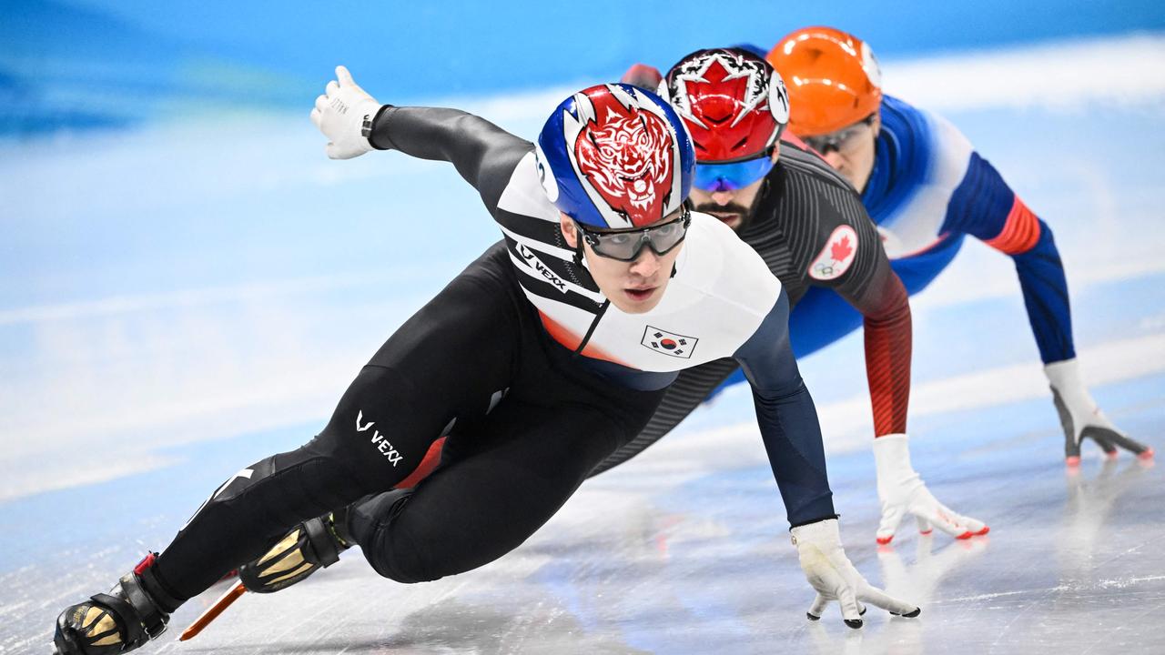 China has responded to cheating accusations after South Korea's Hwang Dae-heon (pictured at front) was disqualified in the men’s short track event. Picture: Anne-Christine POUJOULAT/AFP