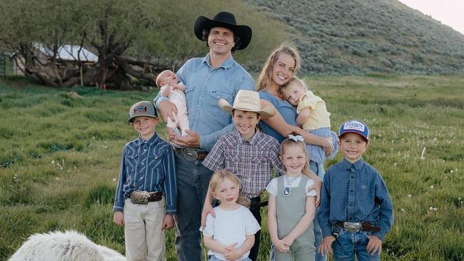 ‘Queen of the tradwives’ Hannah Neeleman with husband Daniel and their children at Ballerina Farm in Utah.