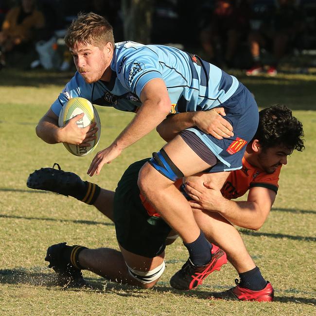 Helensvale Hogs vs Surfers Paradise Dolphins rugby union clash at helensvale hogs rugby club. Helensvale Player No7 Flynn Carson Surfers Player No6 Jackson Searl Pic Mike Batterham