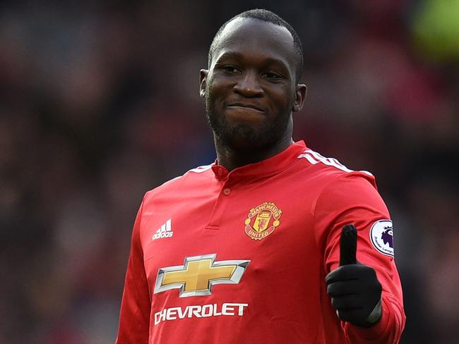 Manchester United's Belgian striker Romelu Lukaku gestures during the English Premier League football match between Manchester United and Brighton and Hove Albion at Old Trafford in Manchester, north west England, on November 25, 2017. / AFP PHOTO / Oli SCARFF / RESTRICTED TO EDITORIAL USE. No use with unauthorized audio, video, data, fixture lists, club/league logos or 'live' services. Online in-match use limited to 75 images, no video emulation. No use in betting, games or single club/league/player publications.  /