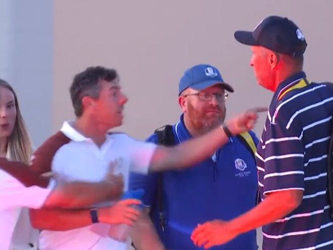 Rory McIlroy had to be held back.