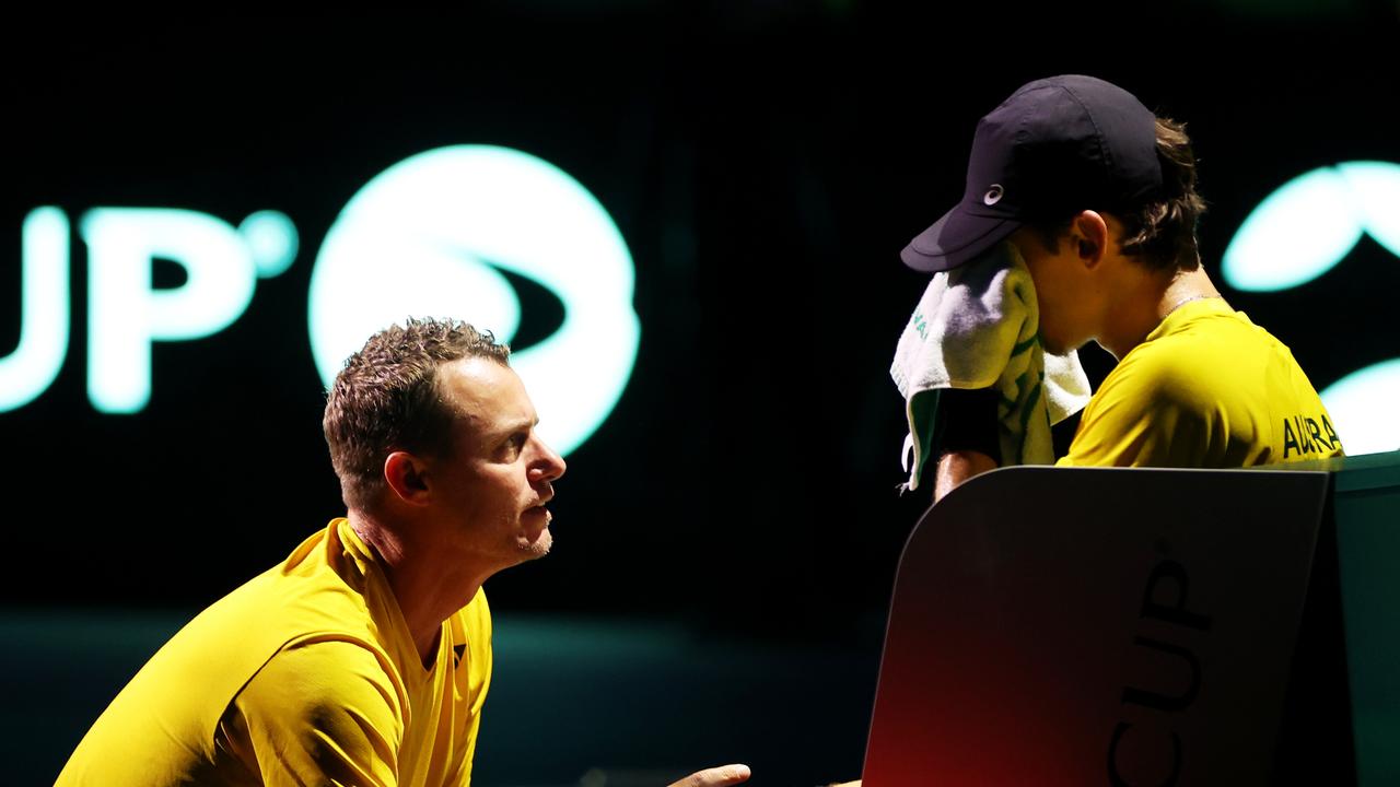 MALAGA, SPAIN - NOVEMBER 26: Lleyton Hewitt speaks to Alex De Minaur of Australia during the Davis Cup Final match against Italy at Palacio de Deportes Jose Maria Martin Carpena on November 26, 2023 in Malaga, Spain. (Photo by Clive Brunskill/Getty Images for ITF)