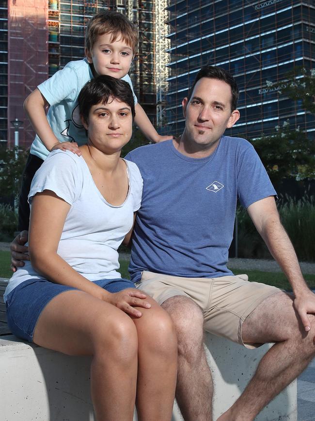 Ryan and Nicole Gooch and their son Harper, 5, at Halifax Road in North Ryde where hundreds of apartments are being built. Picture: David Swift