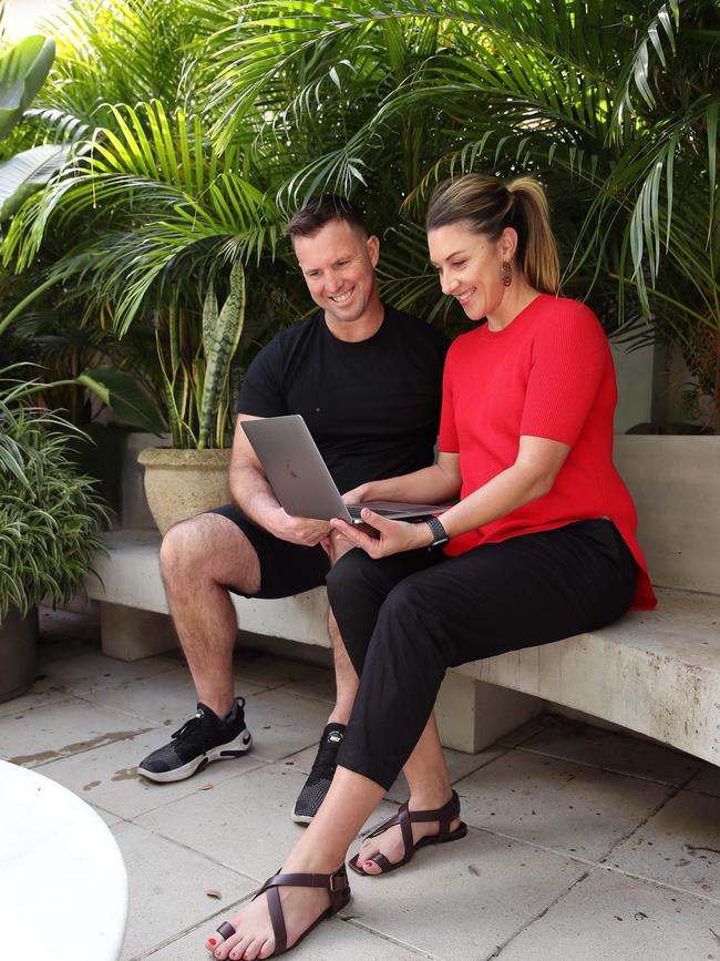 Flow Athletic gym owner Ben Lucas and his wife Talitha Cummins pictured at home using Zoom to have a meetings with staff and clients due to the COVID-19 virus pandemic. Picture: David Swift