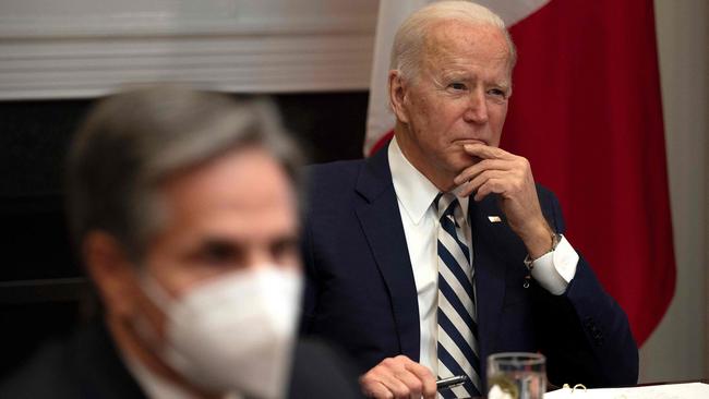 Joe Biden, flanked by US Secretary of State Antony Blinken, left, at the White House in Washington. Picture: AFP