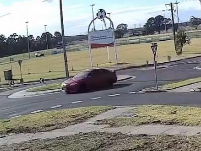 The driver of a red sedan was captured on CCTV speeding through a roundabout on Crinigan Rd in Morwell on Tuesday morning. Picture: Supplied