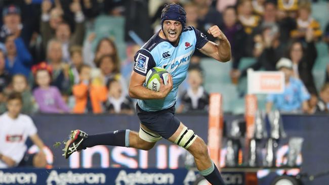 The Waratahs have signed Dean Mumm and Leon Power.