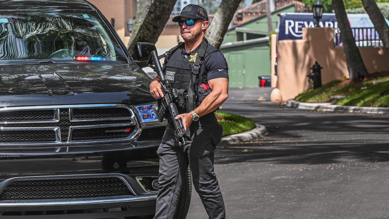 A Secret Service agent is seen in front of the home of former President Donald Trump at Mar-a-Lago in Palm Beach. Picture: AFP