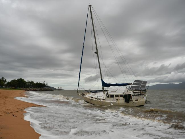 Cyclone Kirrily Townsville 2024. A boat washed up on the Strand, near the C Bar. Picture: Evan Morgan