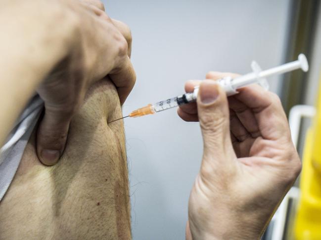 People are urged to get vaccinated. Picture: Tony McDonough/NCA NewsWire