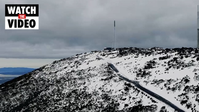 Drone footage from the top of a snowy kunanyi/Mt Wellington