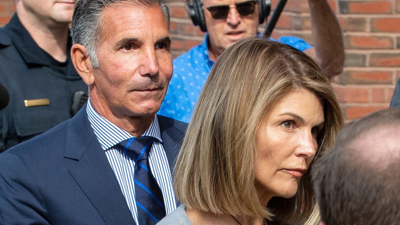 Lori Loughlin and husband Mossimo Giannulli exit the Boston Federal Court house in 2019. Picture: Joseph Prezioso/AFP