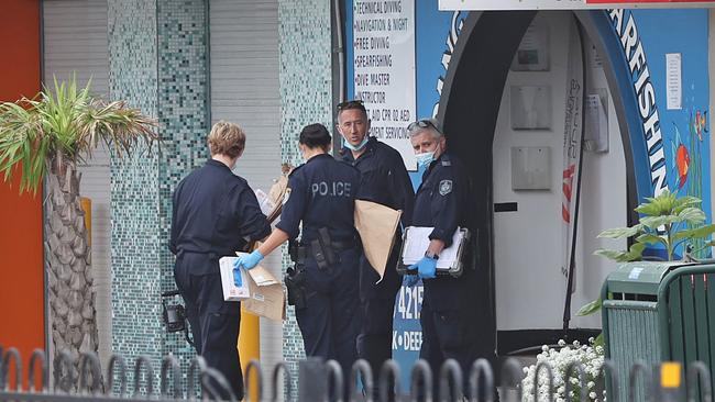 Police at the scene after alleged gunman Simon Fleming was arrested in Windang. Picture: Richard Dobson