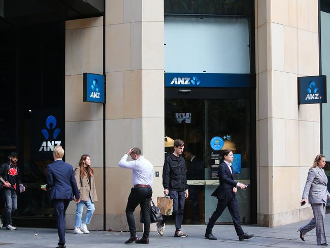 SYDNEY, AUSTRALIA - Newswire Photos - MAY 15:  Members of the public are seen walking past the ANZ Bank in  the Sydney CBD as the Federal Budget is handed down with measures to address inflation and provide relief to households. Picture: NCA Newswire / Gaye Gerard