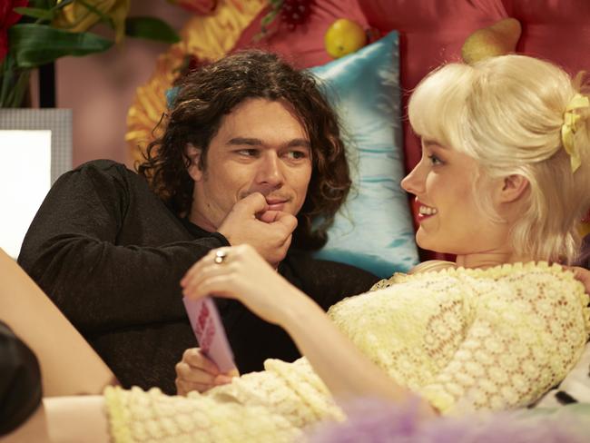 Actors Luke Arnold and Georgina Haig recreate the famous Michael Hutchence/Paula Yates Big Breakfast interview for Channel Seven miniseries INXS: Never Tear Us Apart.