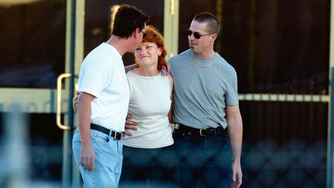 After her release from prison in 2003 with sons Tony (left) and Steven.