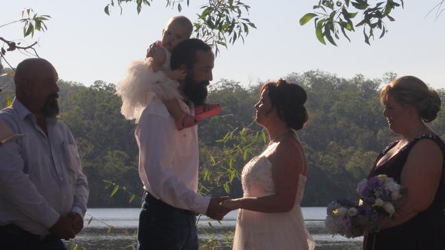 Shaun and Katie Noble during their  wedding ceremony. Picture: Supplied