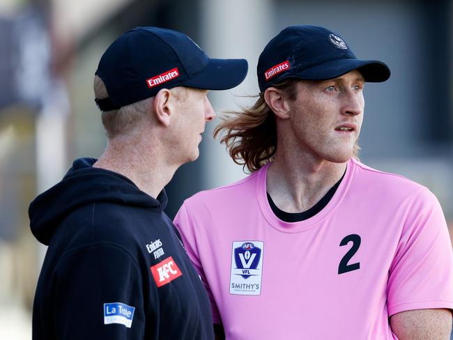 Nathan Murphy retired after an estimated 10 head knocks. Picture: Dylan Burns/AFL Photos via Getty Images)