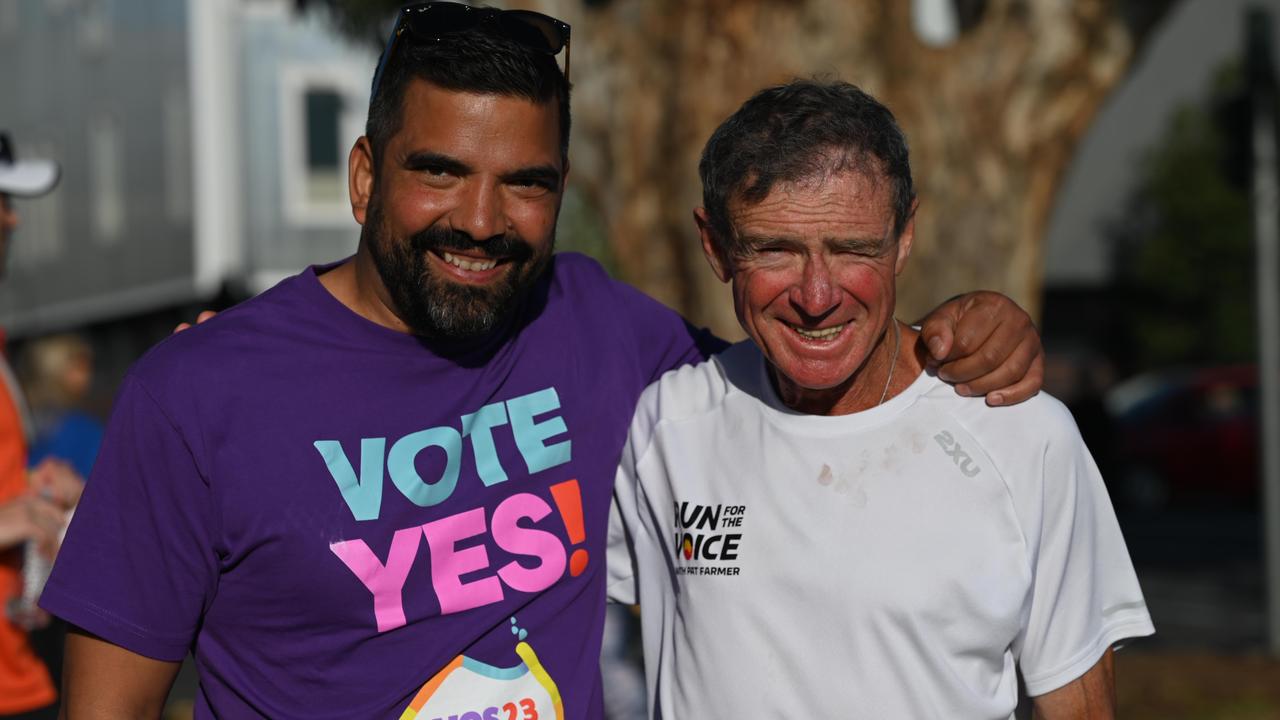 Yes23 campaign director Dean Parkin (left) stands with Voice supporter Pat Farmer in Adelaide. Yes volunteers hop to make one million calls to undecided voters before October 14. Picture: NCA NewsWire / Naomi Jellicoe