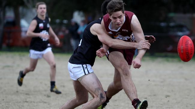 Padbury gets a kick away for the Pioneers in 2018.