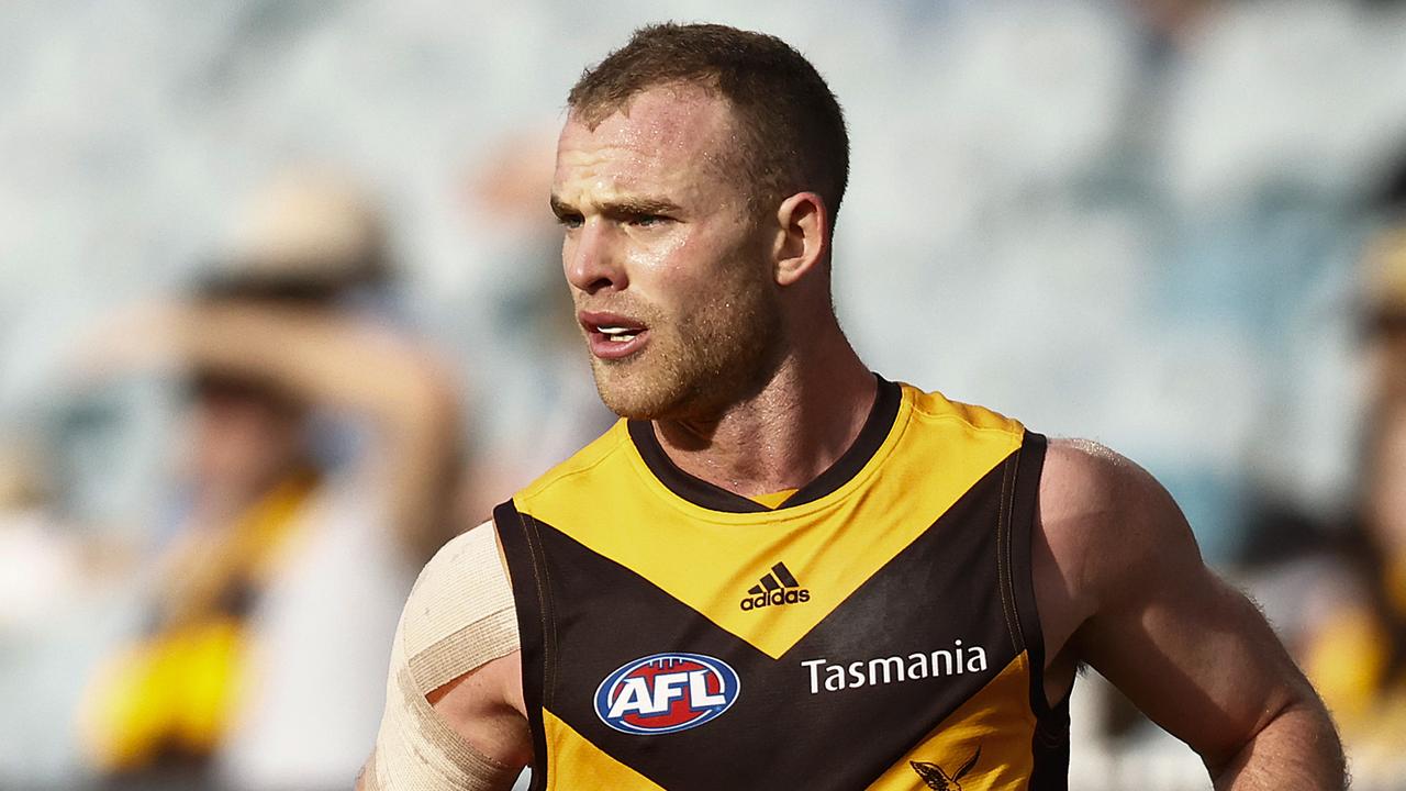 MELBOURNE, AUSTRALIA - JUNE 27: Tom Mitchell of the Hawks in action during the round 15 AFL match between the Greater Western Sydney Giants and the Hawthorn Hawks at Melbourne Cricket Ground on June 27, 2021 in Melbourne, Australia. (Photo by Daniel Pockett/Getty Images)
