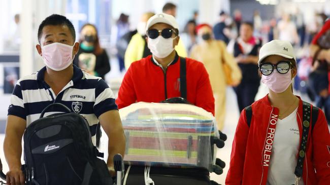 Passengers arrive at Sydney International Airport. Picture: Matrix.