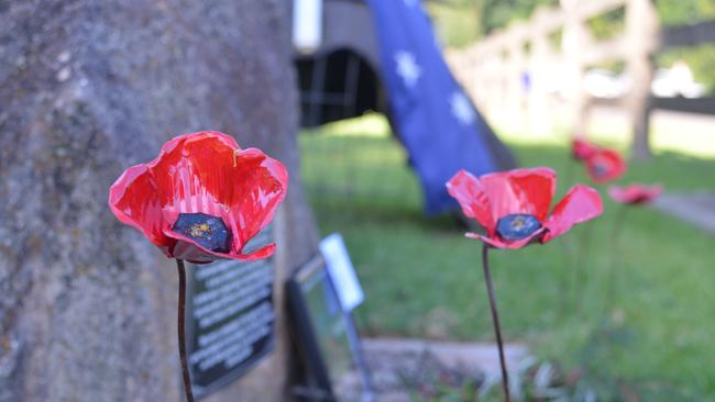 Poppies adorned the memorial at the Bunya Mountains 2016 Anzac Day service.