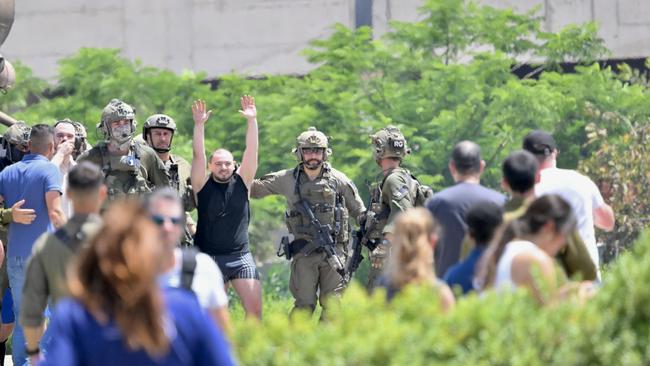 22-year-old Almog Meir, one of the four Israeli hostages that are retrieved after a military operation in the area departs from a military vehicle to be taken to the Sheba Medical Center in Tel Aviv. Picture: Getty Images