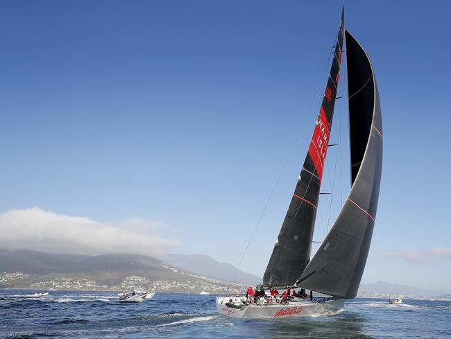 Wild Oats XI skippered by Mark Richards sails up the River Derwent on her way to a 9th line honours victory in the 2018 Sydney to Hobart Yacht Race. The yacht crossed the line in 1d 19hrs 7mins 21secs . Picture: RICHARD JUPE