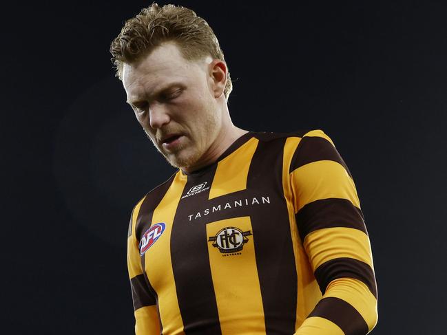 NCA. MELBOURNE, AUSTRALIA. April 19th, 2025 . AFL Round 6 .  Geelong vs Hawthorn at the MCG.   Hawthorn skipper James Sicily leads the Hawks off the MCG  .   Picture: Michael Klein