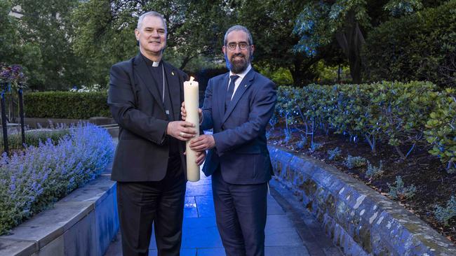 Rabbi Yaakov Glasman and Archbishop Peter A Comensoli unite to celebrate the rare overlap of the two religious holidays. Picture: Wayne Taylor