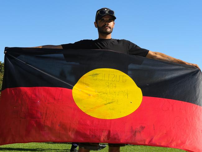 SYDNEY, AUSTRALIA - NewsWire Photos JANUARY, 26, 2021: Paul Silva one of the speakers at the demonstration leads thousands of people have gathered at the Domain Sydney during the demonstration to protest against the national celebration of Australia Day. The Aboriginal people call the 26th January âInvasion Dayâ in Sydney Australia. Picture: NCA NewsWire / Gaye Gerard