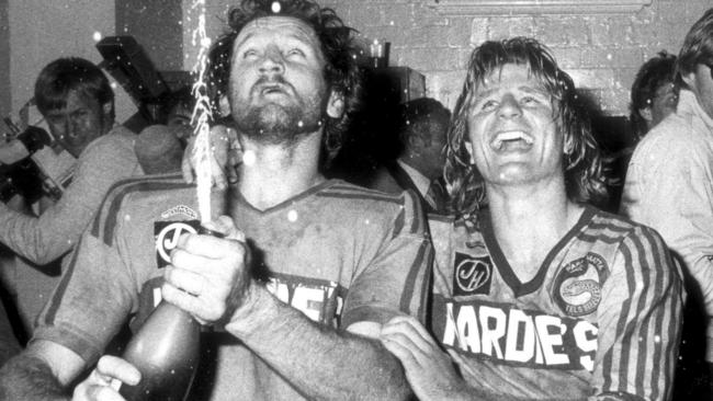 Ray Price and Peter Sterling celebrate the first of Parramatta’s three in a row in 1981. Photo: John Burney