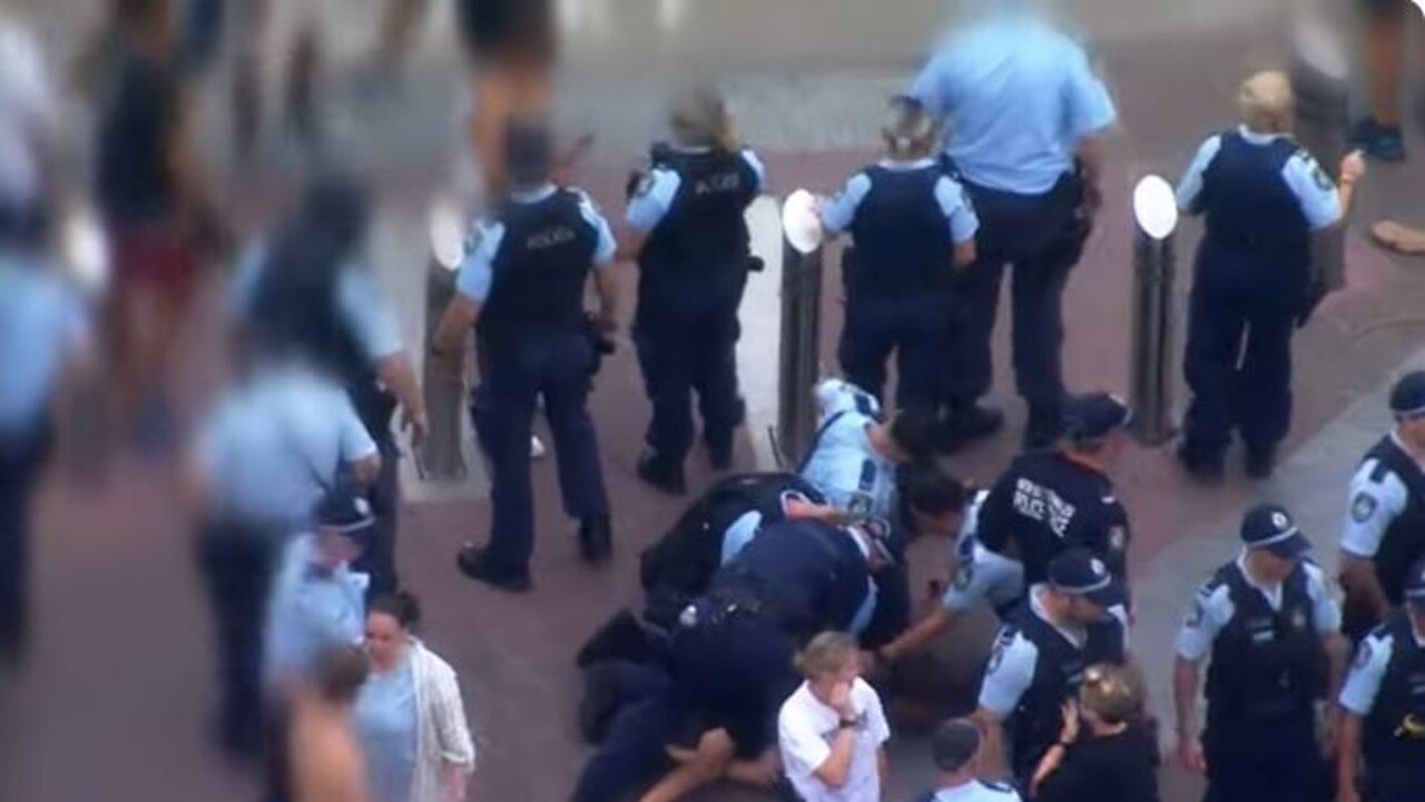 Police pinned a number of teenagers to the ground. Picture: 9News