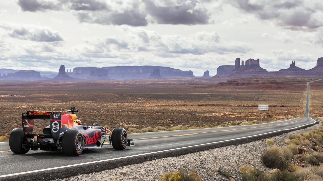 Daniel Ricciardo drives his F1 car in Monument Valley, Arizona USA.