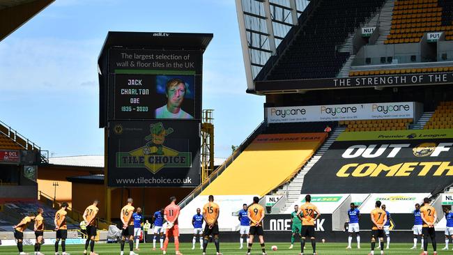 Players stand for a minute’s silence in honour of Jack Charlton before the English Premier League match between Wolverhampton Wanderers and Everton at the Molineux stadium in Wolverhampton. Picture: AFP
