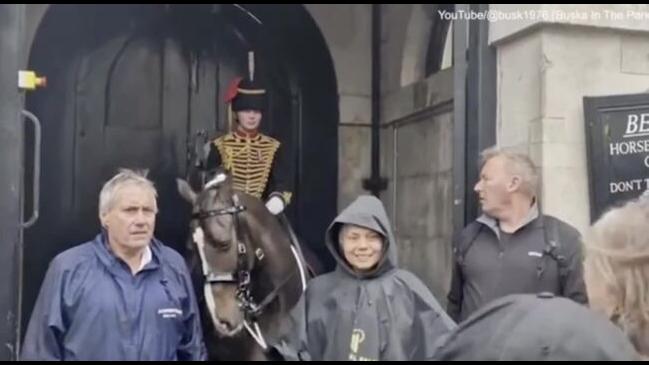 Moment King's Guard bursts into tears