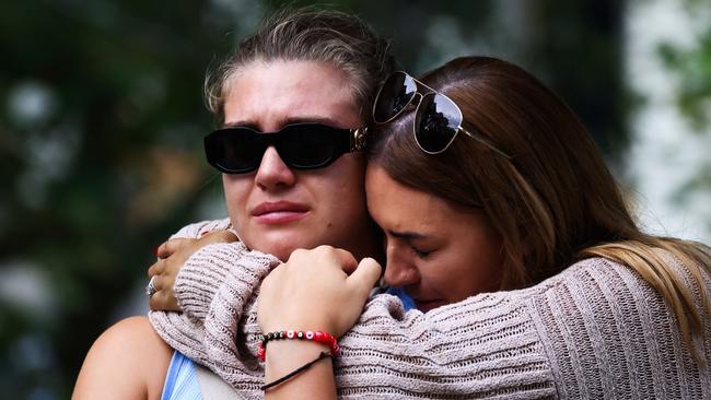 People gather to remember Jesse Baird and Luke Davies during a public vigil at Green Park on the eve of Mardi Gras. Picture: Jenny Evans/Getty Images