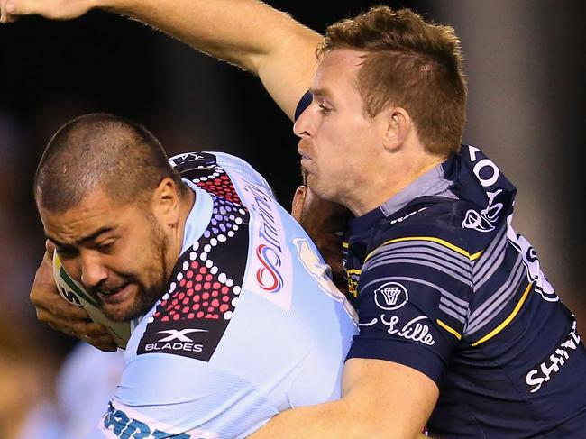 SYDNEY, AUSTRALIA - MAY 18:  Andrew Fifita of the Sharks is tackled by Michael Morgan of the Cowboys during the round 11 NRL match between the Cronulla Sharks and the North Queensland Cowboys at Southern Cross Group Stadium on May 18, 2017 in Sydney, Australia.  (Photo by Jason McCawley/Getty Images)