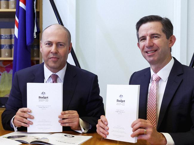 Treasurer Josh Frydenberg and Finance Minister Simon Birmingham with the 2021 budget papers. Picture: Dominic Lorrimer – Pool/Getty Images