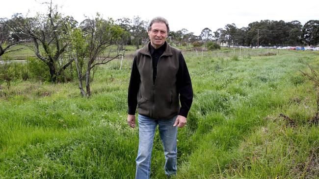 Gaetano 'Guy' Boncardo on his parents’ old farm at Schofields. Picture: Peter Kelly