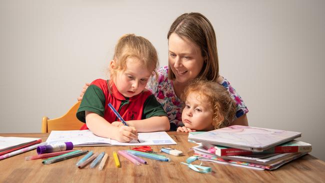 Parents who work full time are having to balance work and homeschooling or entertaining young children. Picture: Brad Fleet