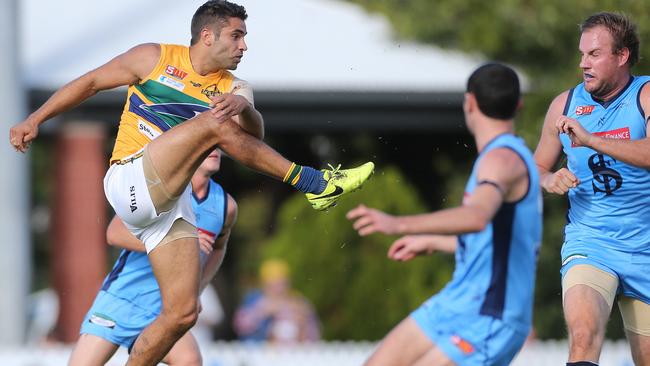 Eagles’ Jared Petrenko gets his kick away against Sturt. Picture: STEPHEN LAFFER