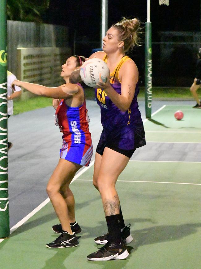 Australian basketball representative and Melbourne Boomers centre Cayla George playing for Phoenix Fierce against Sharks in the opening round of the Cairns Netball Association's Senior Division 1 competition. Picture: Vilimone Baleilevuka/Vili Photography