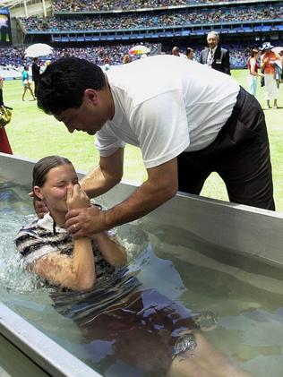 One of 500 to get baptised at the Jehovah’s Witnesses convention at Telstra Stadium in Sydney, 2003. Picture: Kristi Miller.